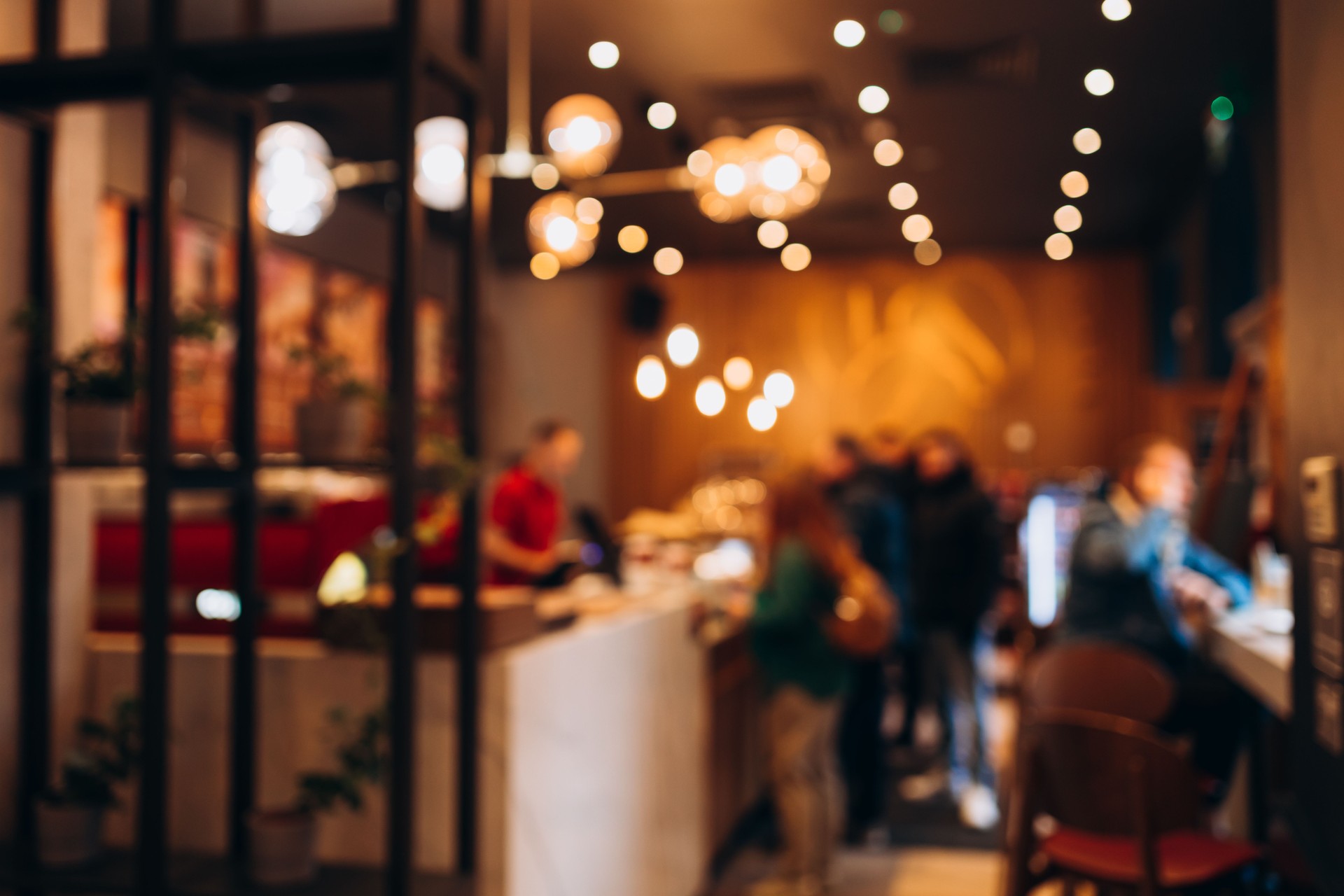 Abstract blur defocus coffee shop cafe or restaurant interior background. Blurred cafe restaurant with bokeh background